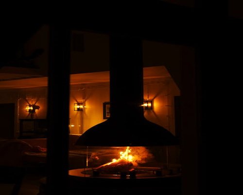 Cozy dimly lit living room ready for evening relaxation